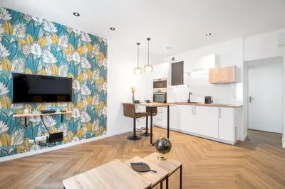 Cuisine ou kitchenette dans l'établissement L'Appartement des Ducs avec Baignoire Double