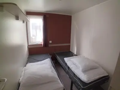 Un ou plusieurs lits dans un hébergement de l'établissement 2-bedroom mobile home sleeps 4