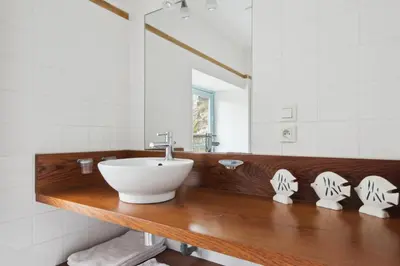 Salle de bains dans l'établissement Gite Bleu