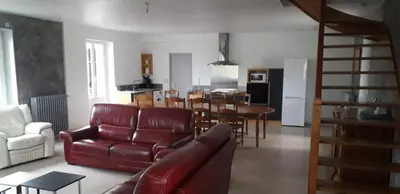 Coin salon dans l'établissement Gîte de la Poilane - Maison avec piscine & vue sur vignes, proche Angers