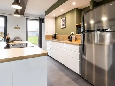 Cuisine ou kitchenette dans l'établissement Grande grange rénovée avec jardin et spa proche de Nantes - FR-1-306-1234