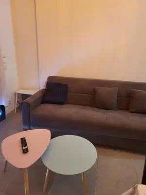 Coin salon dans l'établissement Joli nid douillet