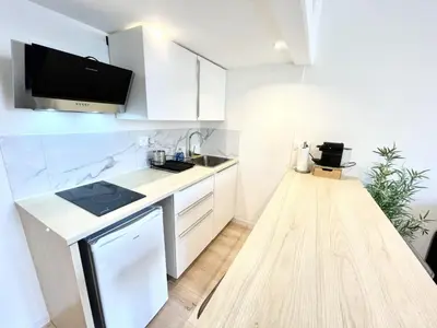 Cuisine ou kitchenette dans l'établissement Saint Leonard