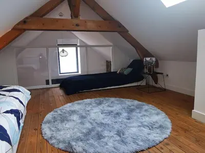 Un ou plusieurs lits dans un hébergement de l'établissement Ô'date gîte &spa