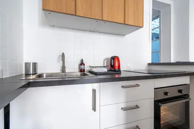Cuisine ou kitchenette dans l'établissement Le Puits d'Argent - Spacieux T2 au Coeur de Nantes