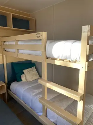 Un ou plusieurs lits superposés dans un hébergement de l'établissement Camping Cœur De Vendée