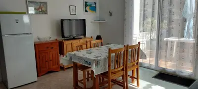 Cuisine ou kitchenette dans l'établissement Détente à la mer
