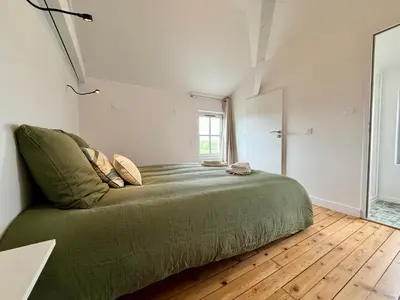 Coin salon dans l'établissement Jolie m'Home - Maison 15 pers, 5 sdb, 5 WC, proche Puy du Fou