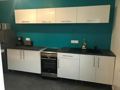 Cuisine ou kitchenette dans l'établissement Les embruns