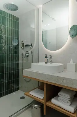 Salle de bains dans l'établissement Hôtel Parc du Landreau