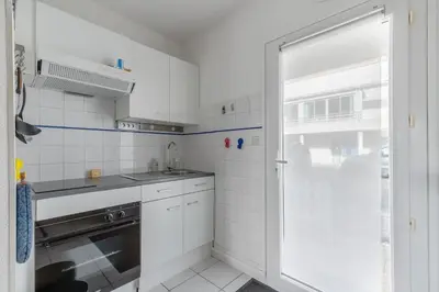 Cuisine ou kitchenette dans l'établissement LA ROSE DE L OCEAN