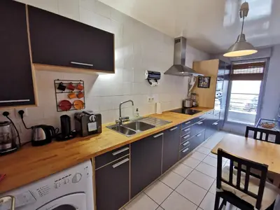 Cuisine ou kitchenette dans l'établissement Le Voyage de Jade - Les Maisons de Madeleine