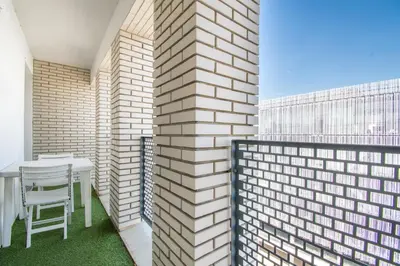 Balcon ou terrasse dans l'établissement Cosy T2 de 50 m² Centre-Ville avec Garage & Balcon