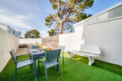 Coin salon dans l'établissement 600m de la plage - Maison pour 5 - Terrasse