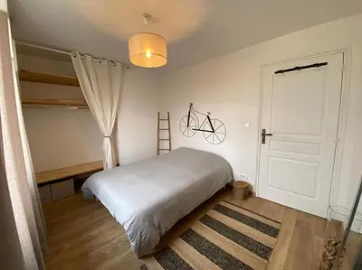 Un ou plusieurs lits dans un hébergement de l'établissement Villa avec jacuzzi proche de la mer et du centre