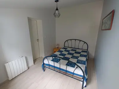 Un ou plusieurs lits dans un hébergement de l'établissement Maison bord de mer, dans impasse au calme d'une résidence.