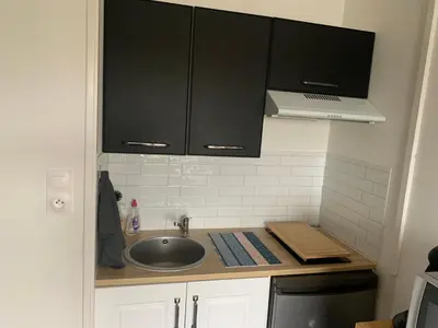 Cuisine ou kitchenette dans l'établissement Studio Bords de plage