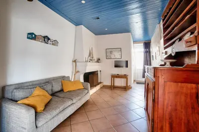 Coin salon dans l'établissement Jolie maison avec cour pour 5 personnes