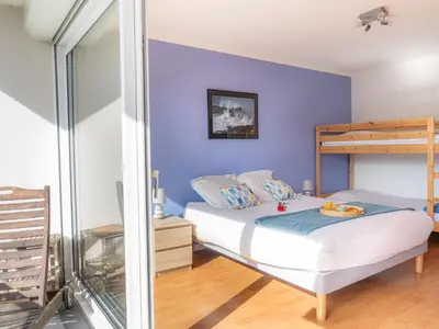Un ou plusieurs lits dans un hébergement de l'établissement Apartment L'Ermitage-1 by Interhome