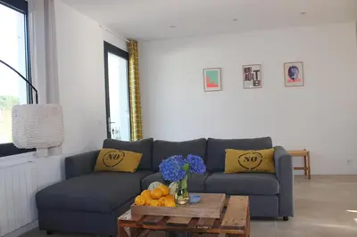Coin salon dans l'établissement Maison 8 personnes à 100 m de la plage de la Clère