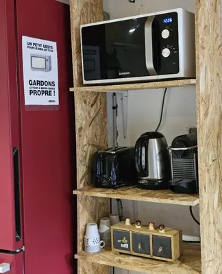 Cuisine ou kitchenette dans l'établissement Studio confort chez Lolita et Wilfried