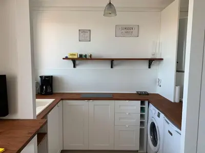 Cuisine ou kitchenette dans l'établissement Studio face mer Accès direct à la plage
