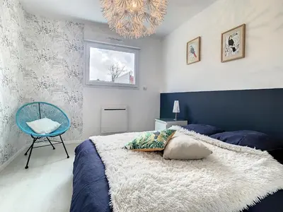 Un ou plusieurs lits dans un hébergement de l'établissement Maison cosy au calme parking privé inclus