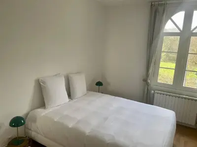 Un ou plusieurs lits dans un hébergement de l'établissement Appartement à Clisson