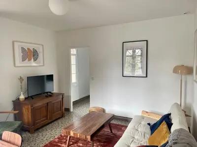 Télévision ou salle de divertissement dans l'établissement Appartement à Clisson