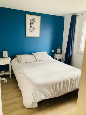 Un ou plusieurs lits dans un hébergement de l'établissement Charmante maison familiale entre mer et forêt