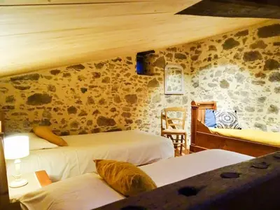 Un ou plusieurs lits dans un hébergement de l'établissement Terre et Eau - Gîte avec chambre complémentaire
