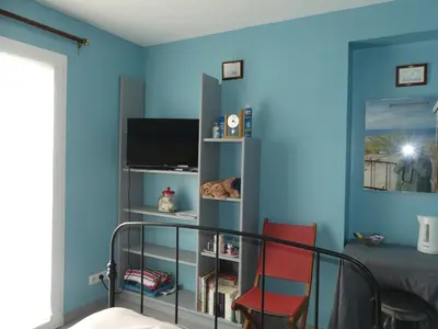 Télévision ou salle de divertissement dans l'établissement TY BIHAN