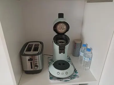 Cuisine ou kitchenette dans l'établissement Chambre privée