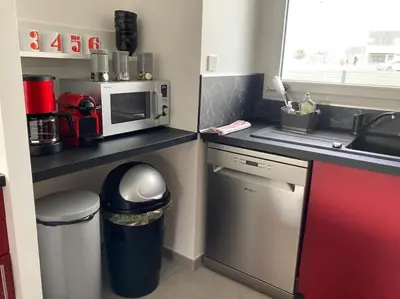 Cuisine ou kitchenette dans l'établissement Chez Nana