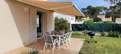 Jardin de l'établissement Maison Saint Jean de Monts 7 personnes - 3 chambres