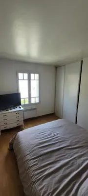 Un ou plusieurs lits dans un hébergement de l'établissement Maison Saint Jean de Monts 7 personnes - 3 chambres