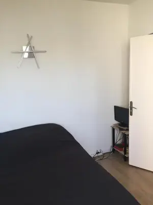 Télévision ou salle de divertissement dans l'établissement Chambre à louer 1 à 2 personnes chez l'habitant