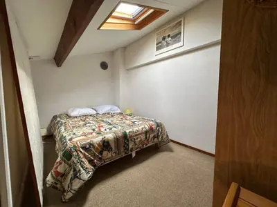 Un ou plusieurs lits dans un hébergement de l'établissement Maison de vacances à Notre-Dame-de-Monts avec piscine et parking privés - FR-1-540-209